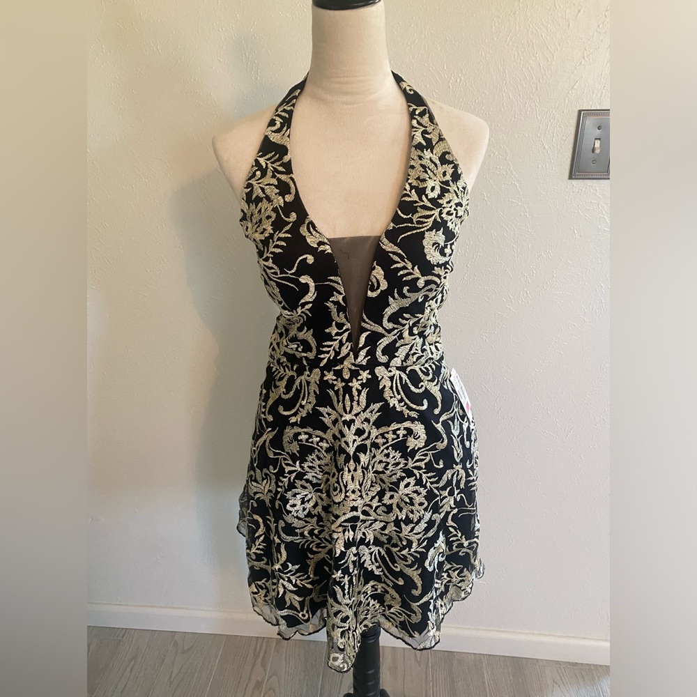 Formal black halter dress size 11 xtraordinary new with tags